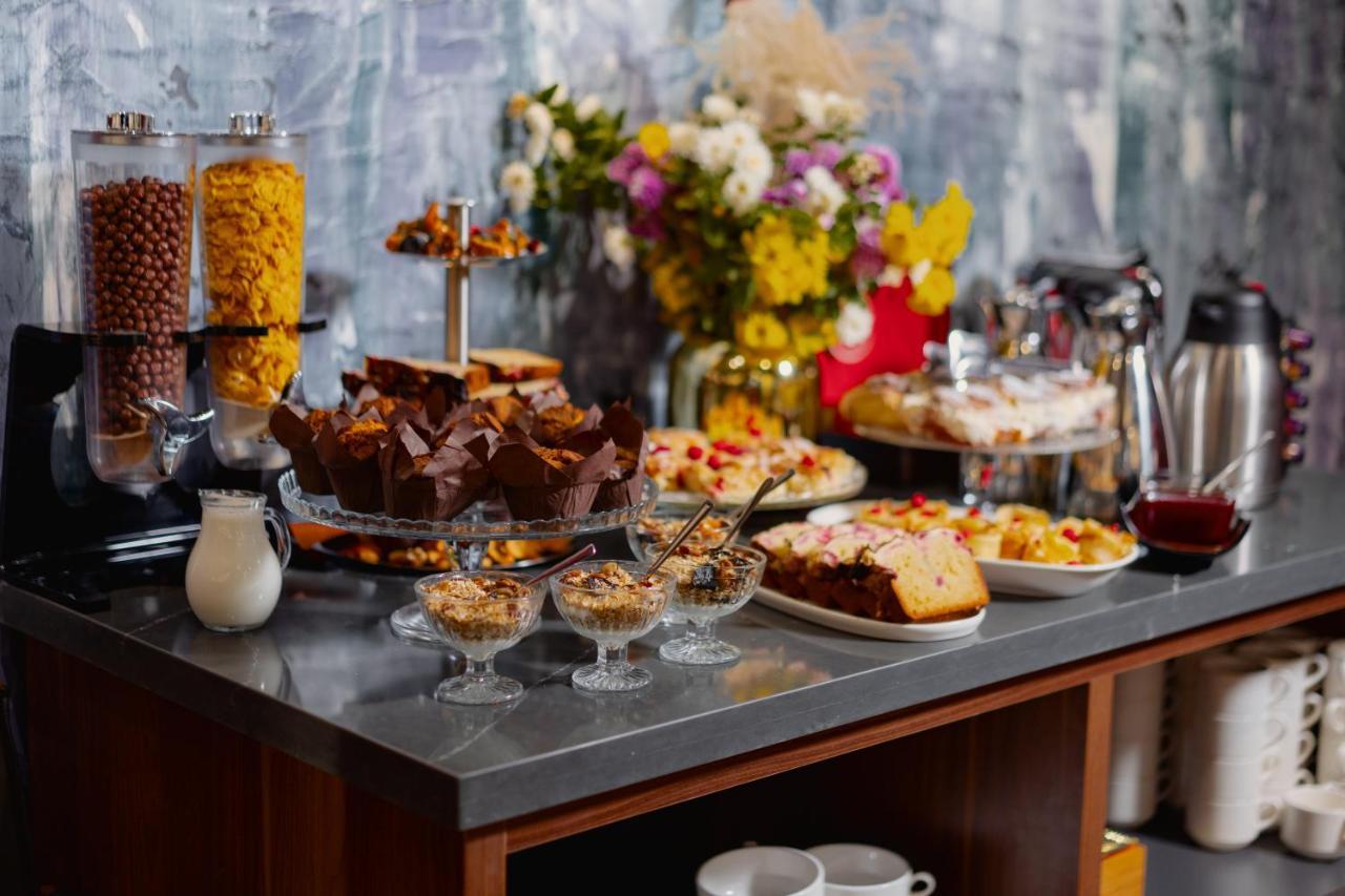 Tapis Rouge Design Boutique Hotel Batumi Ngoại thất bức ảnh A buffet of desserts